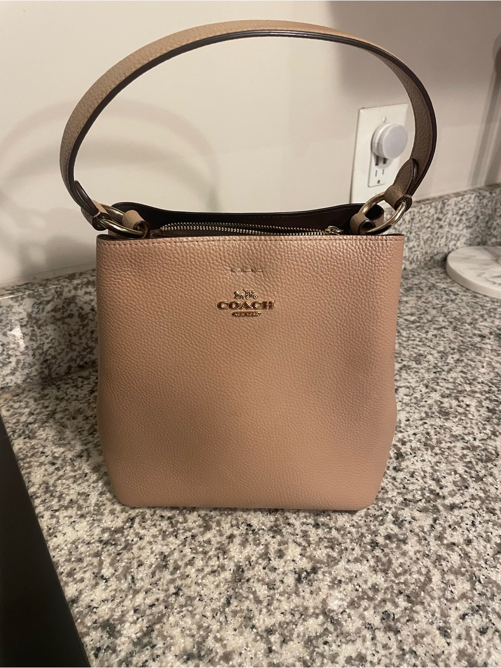 Coach Outlet Pebbled Leather bucket Bag in Taupe